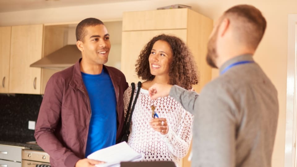 tenants having conversation with landlord